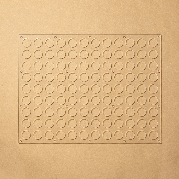 Clear acrylic plate with a grid of circular holes