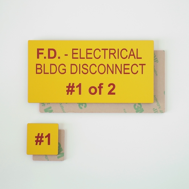 Yellow placards with red text and adhesive backing