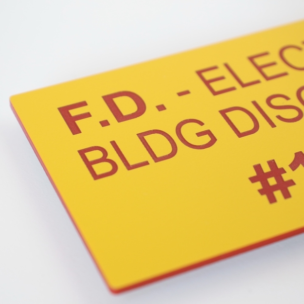 Fine engraving on a yellow/red placard